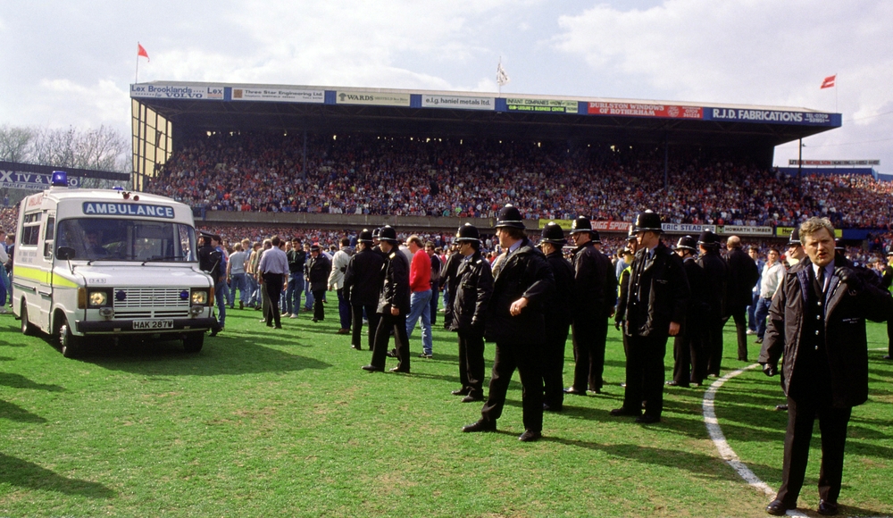 FILE PHOTO: An ambulance on the pitch  / ACTION IMAGES