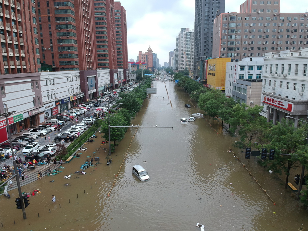Aerial view shows a flooded road section following heavy rainfall in Zhengzhou  / CHINA DAILY